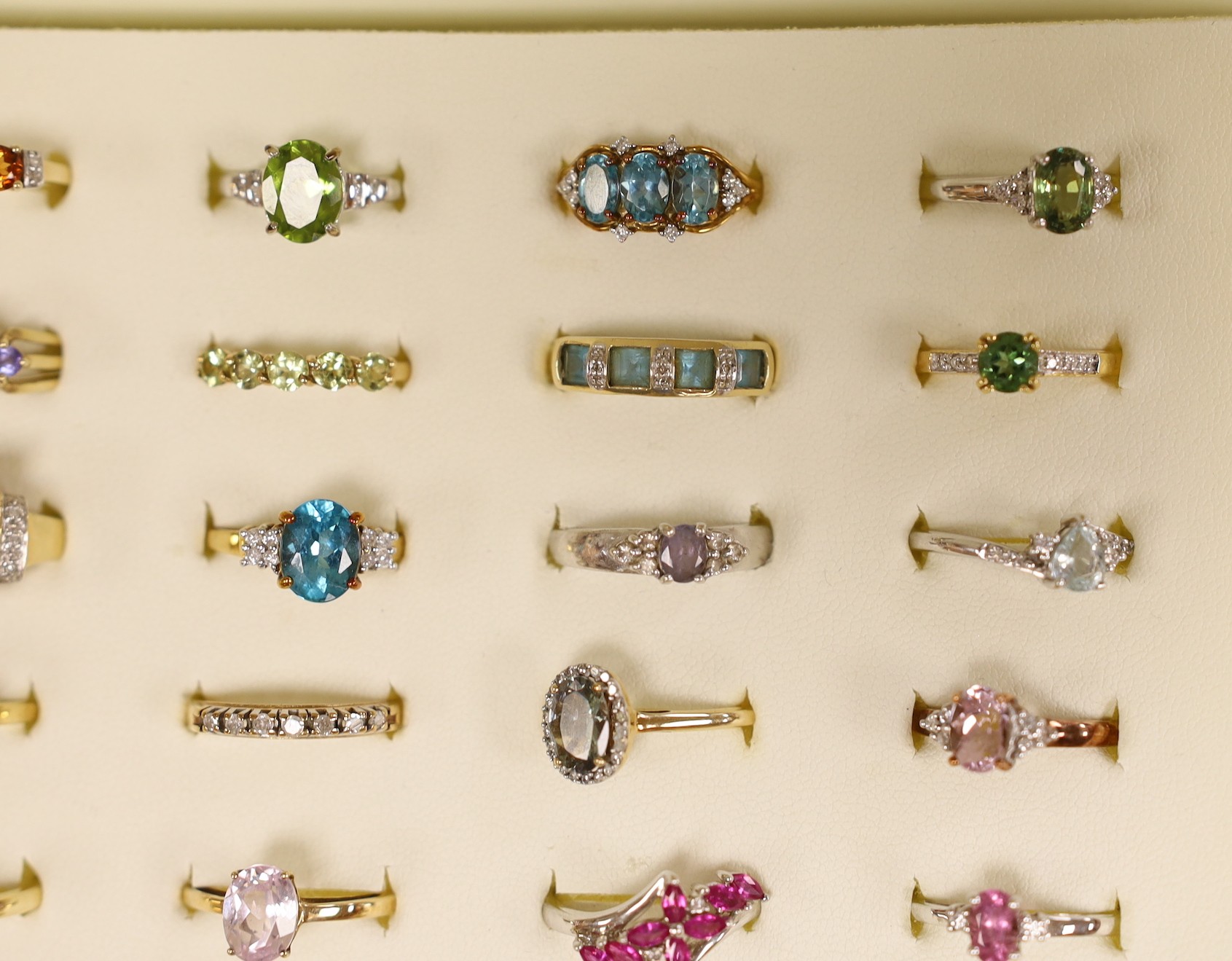 Forty seven assorted modern 9ct gold and gem set dress rings, including amethyst, citrine and garnet, two stamped 10k and one 9k and three 18ct gold and gem set dress rings, in ring box.